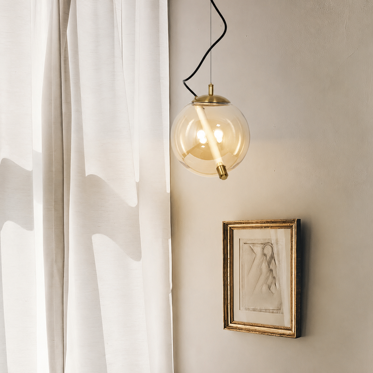Lifestyle image of amber globe led pendant light for elegant dining room decor styling and modern home interior lighting.