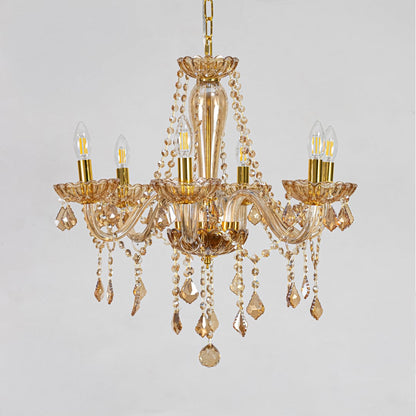 Golden crystal chandelier with decorative beads displayed on white background perfect for classic interior ceilings.