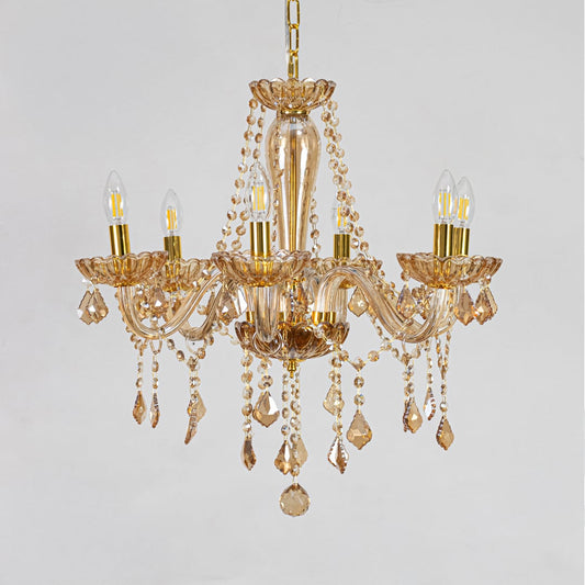 Golden crystal chandelier with decorative beads displayed on white background perfect for classic interior ceilings.