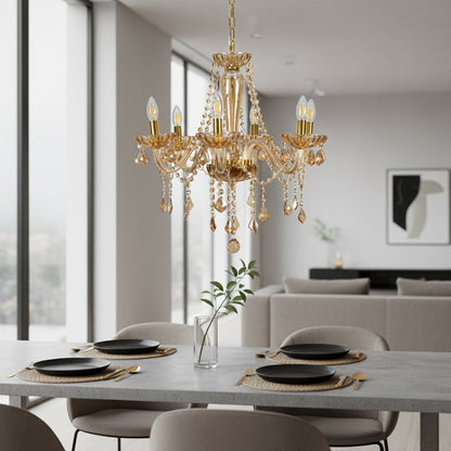 Golden crystal chandelier with elegant arms and warm lighting adds luxury charm to dining room or living room ceilings.