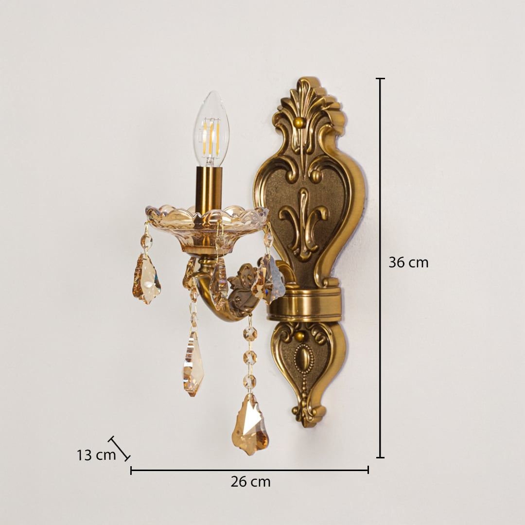 Wall light with gold metal frame and amber crystals shown with 36 cm height and 26 cm width and 13 cm depth for accurate placement.