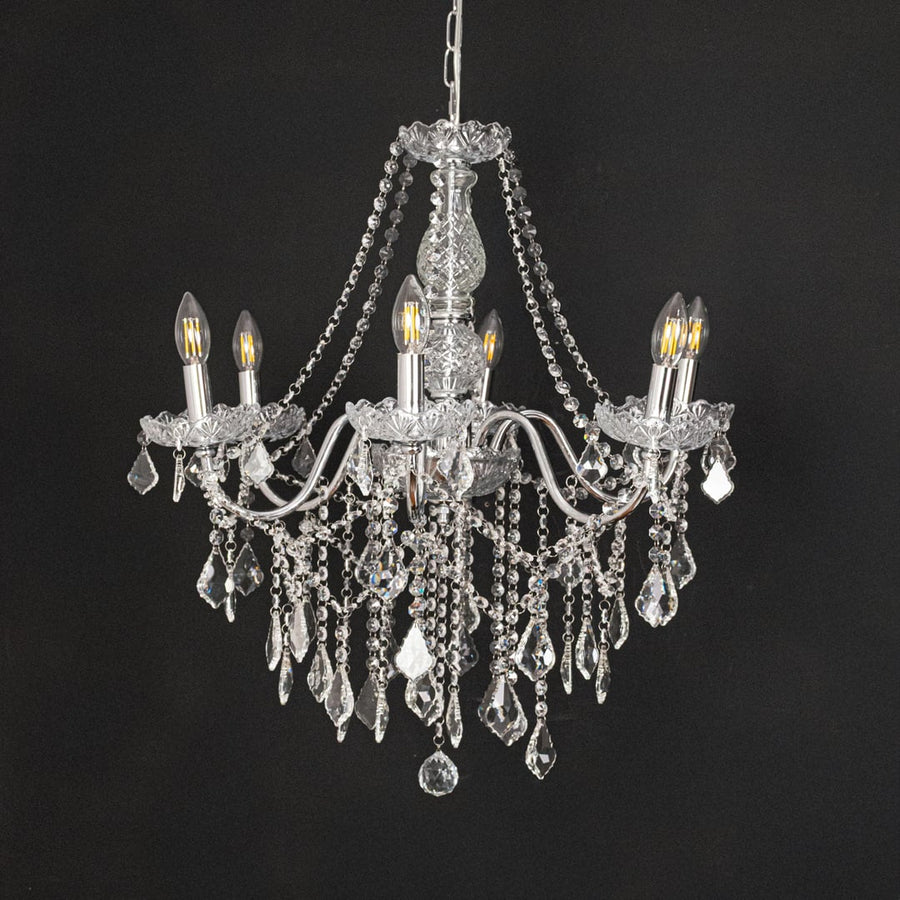Silver metal crystal chandelier shown on black background highlighting premium crystal detailing for elegant interiors.