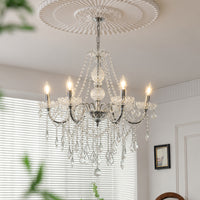 Luxury white metal crystal chandelier for living room dining room and elegant home interiors with warm ambient lighting.