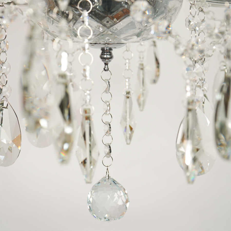 Closeup image of waterfall crystal chandelier for modern dining room decor styling with elegant crystal detailings.
