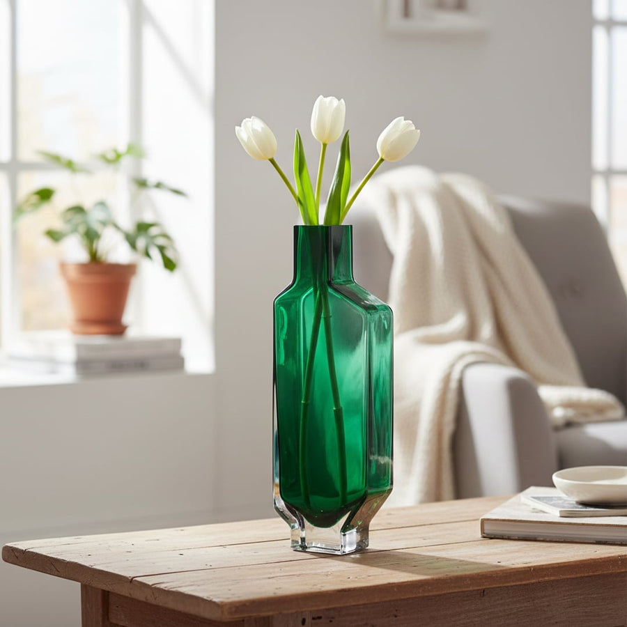 Green art glass vase styled on living room console modern decorative glass accent for shelf table or center styling home.
