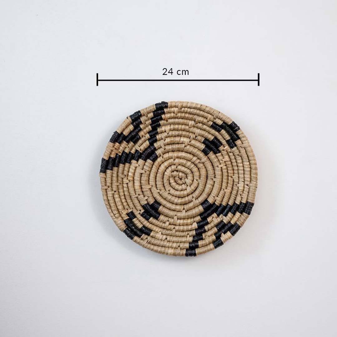 Handwoven seagrass round wall basket decor in natural beige and black with abstract spiral pattern and size guide.