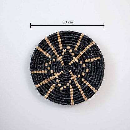 Handwoven seagrass round wall basket decor in natural beige and black with sunburst woven pattern and size guide.