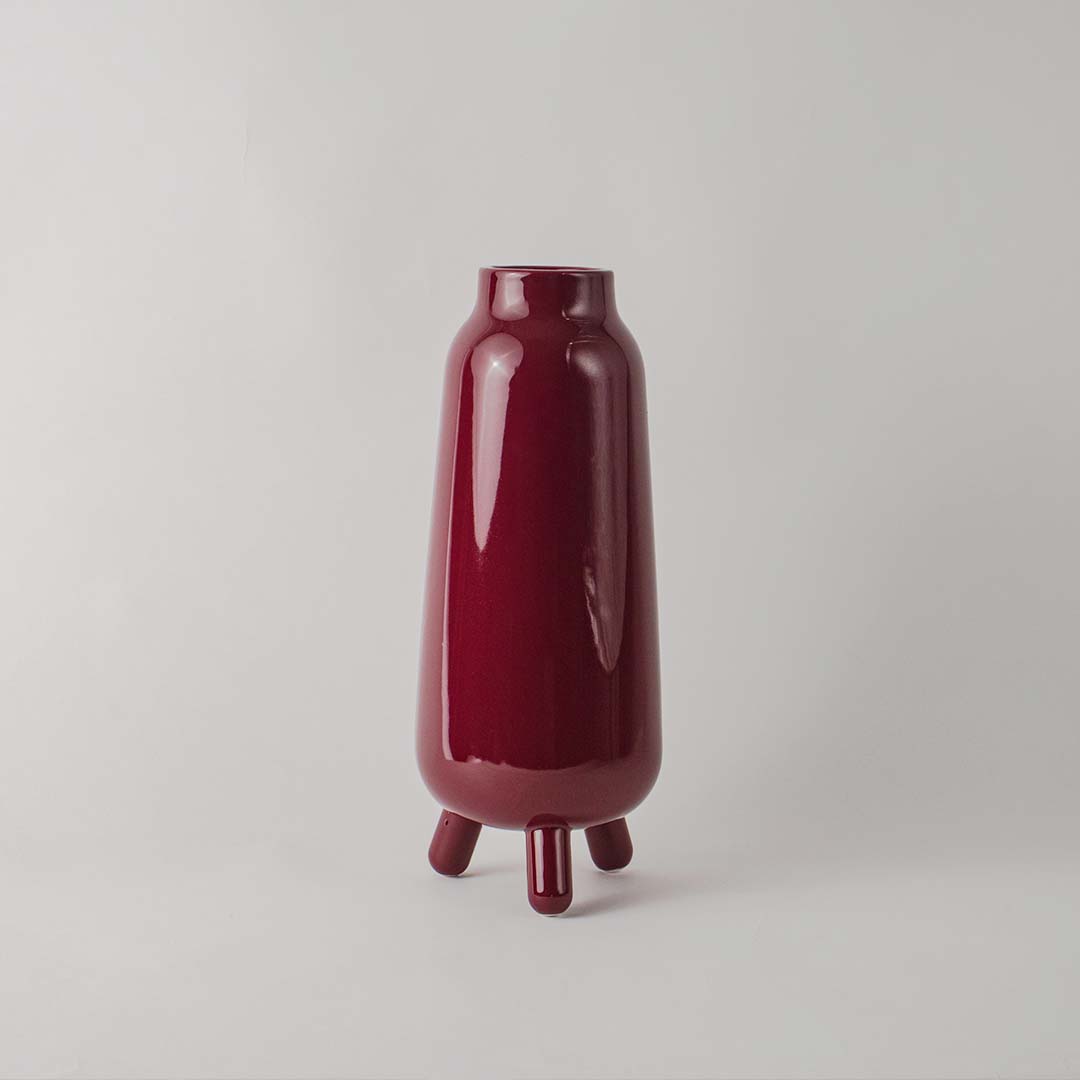 Baldarian wine color deco vase on white background showcasing smooth surface rich tone and statement styling for modern interiors.