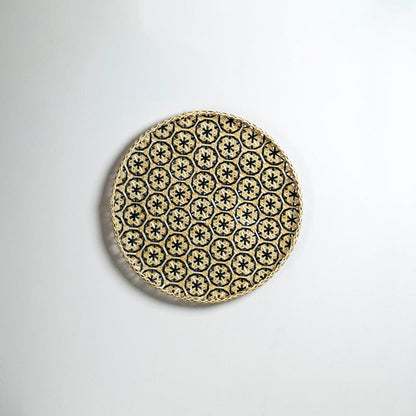 Natural decorative wall plate with intricate geometric pattern for artistic wall styling and modern home decor.