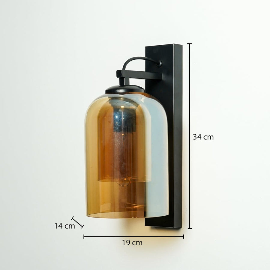 Amber glass black metal wall light with 34 cm height 19 cm width and 14 cm depth for modern decor spaces.