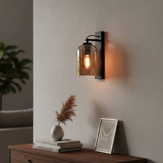 Modern amber glass wall light with warm glow for luxury hallway and contemporary home decor spaces.