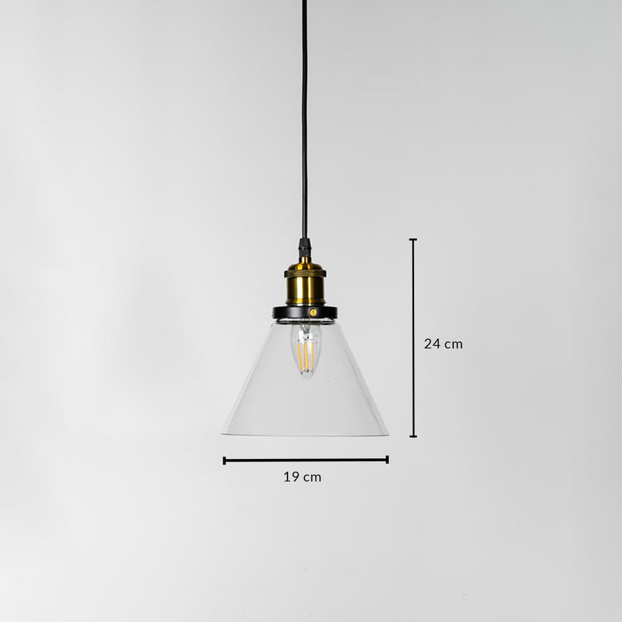 Pendant light with clear glass shade brass fitting and black cord shown with 24cm height and 19cm width.