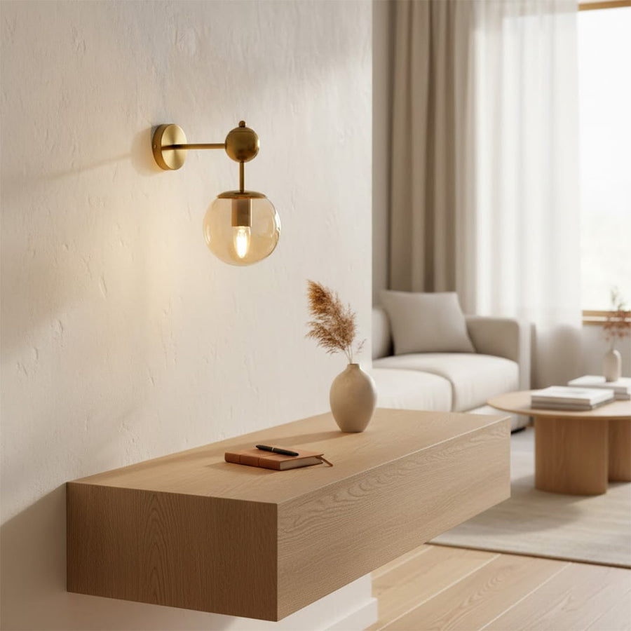 Modern gold glass wall light for elegant living room and contemporary home decor styling spaces.