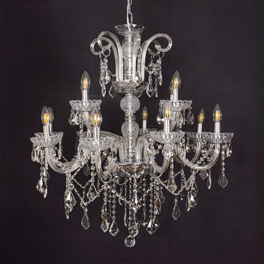 Large clear crystal chandelier shown on black background highlighting premium crystal detailing for elegant ceilings.