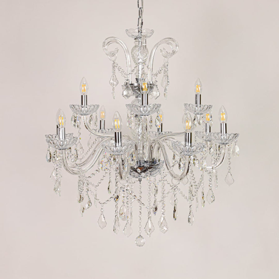 Large clear crystal chandelier displayed on white background ideal for classic bright interior ceiling styling.
