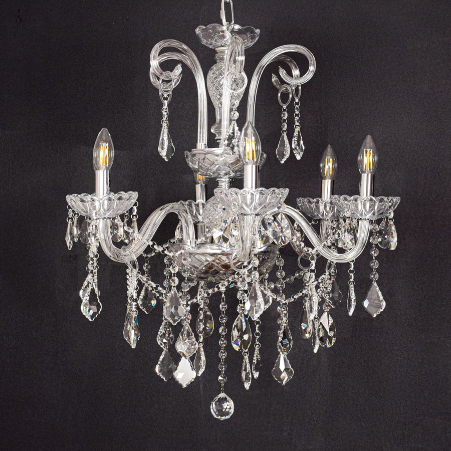 Clear crystal chandelier shown on black background highlighting premium crystal details for elegant ceiling decor.