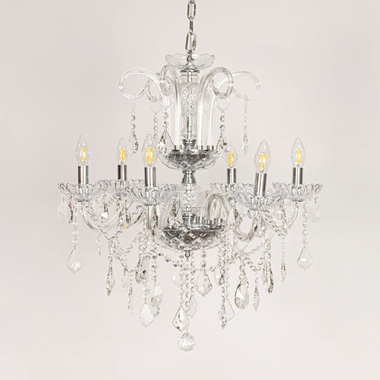 Clear crystal chandelier displayed on white background ideal for classic bright interior ceiling styling.