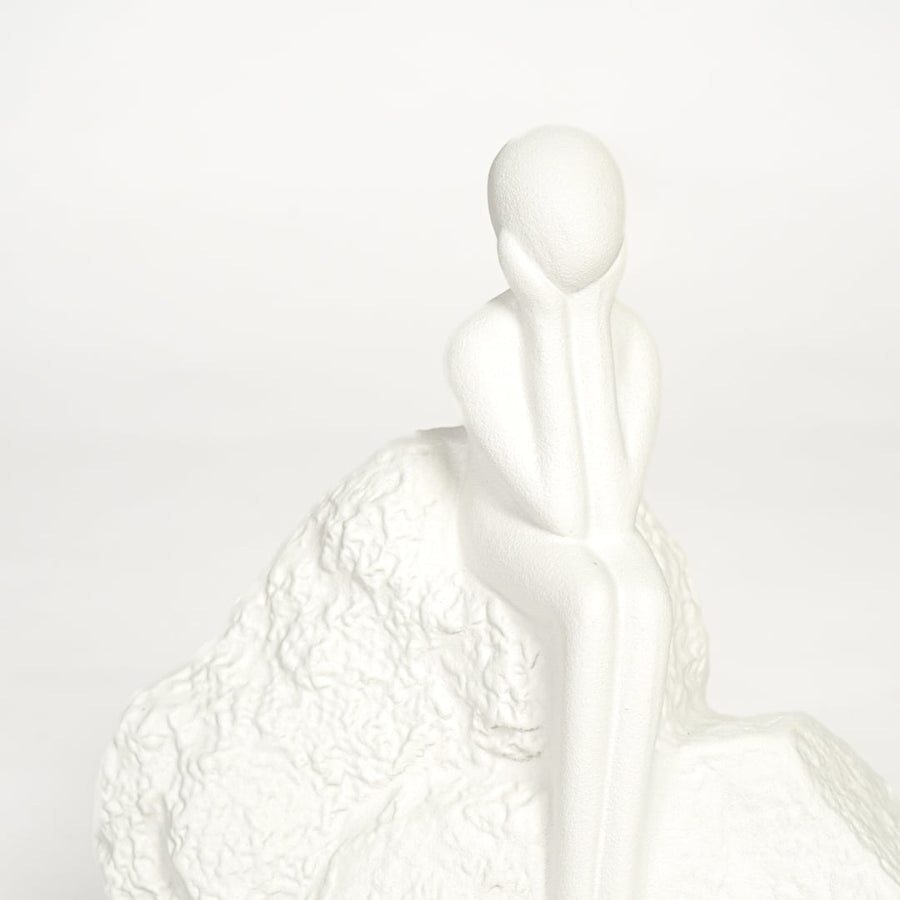 Matte white ceramic abstract human figurine with artistic texture for console table and office decor.