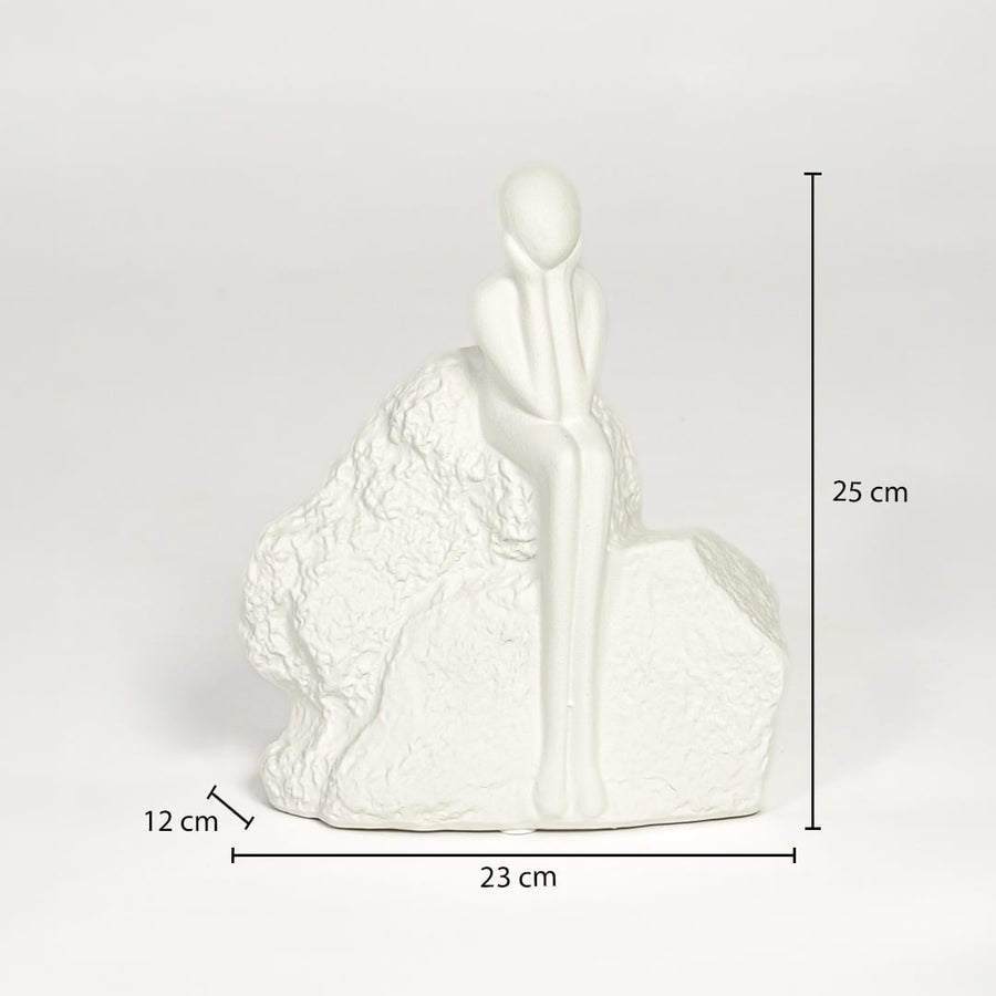White ceramic sitting figurine sculpture 25 cm height 23 cm width ideal for console table and shelf decor.