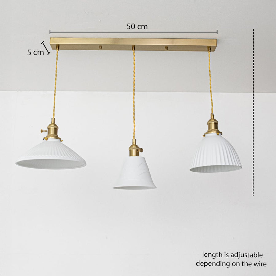 Triple white glass pendant light dimension image with adjustable length and 50 cm canopy for elegant dining placement.