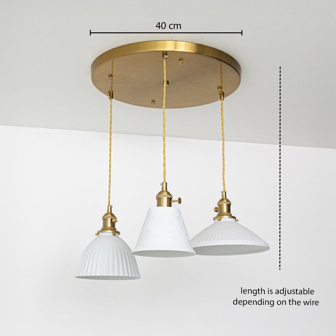 Triple white glass pendant light dimension image with adjustable length and 40 cm canopy for modern dining placement.
