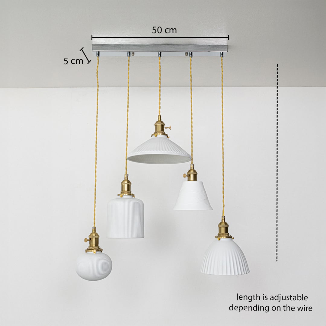 Five assorted white glass pendant lights dimension image with adjustable length and 50 cm canopy for modern dining placement.