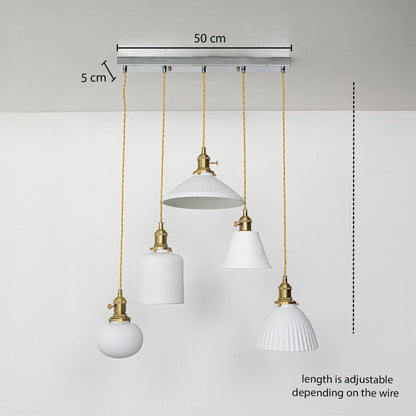 Five assorted white glass pendant lights dimension image with adjustable length and 50 cm canopy for modern dining placement.