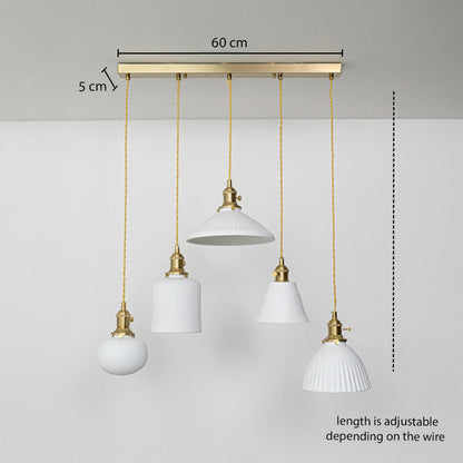 Five assorted white glass pendant lights dimension image with adjustable length and 60 cm canopy for elegant dining placement.