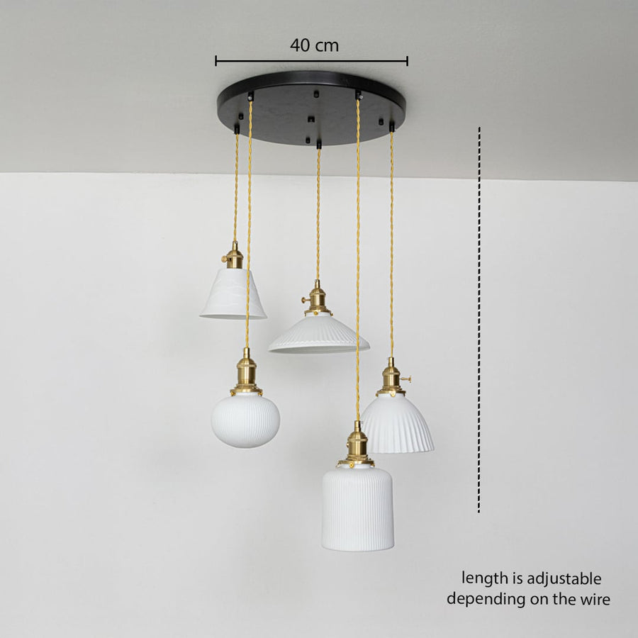 Five assorted white glass pendant lights dimension image with adjustable length and 40 cm canopy for modern dining placement.