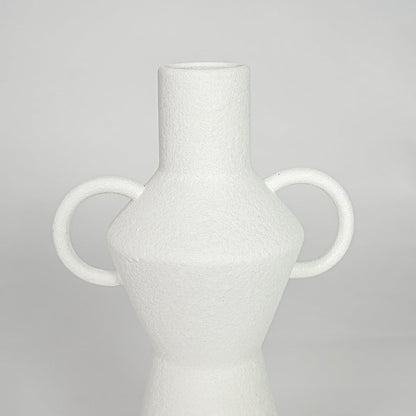 Closeup white ceramic textured decorative vase detail modern tall flower vase for table shelf console decor.