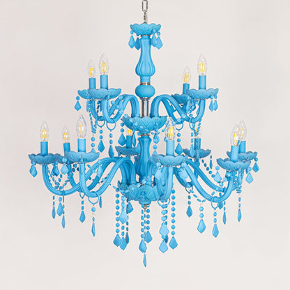 Large blue crystal chandelier displayed on white background ideal for colorful modern interior ceiling styling.