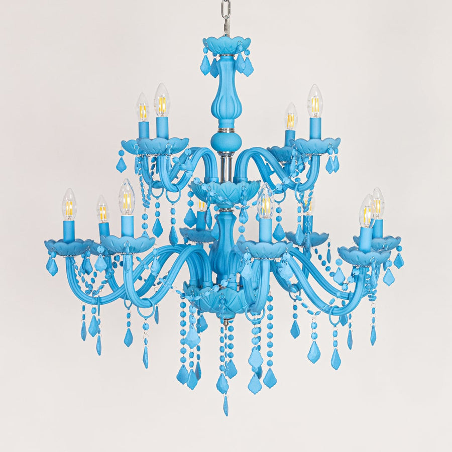 Large blue crystal chandelier displayed on white background ideal for colorful modern interior ceiling styling.