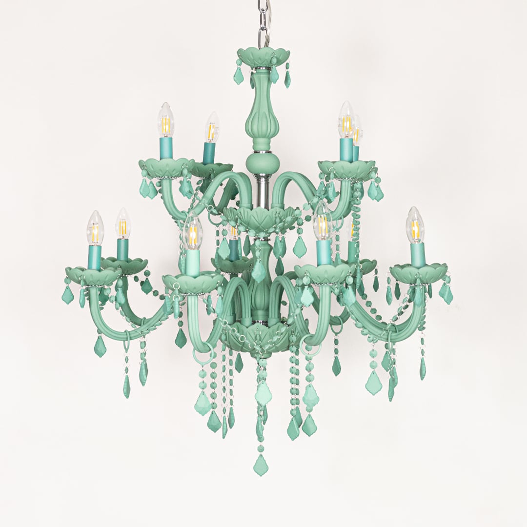 Large green crystal chandelier displayed on white background ideal for colorful bright interior ceiling styling.