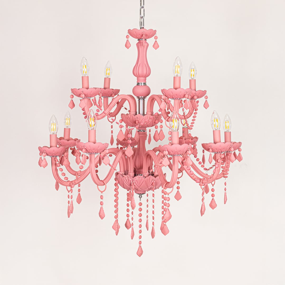 Large pink crystal chandelier displayed on white background ideal for colorful bright interior ceiling styling.