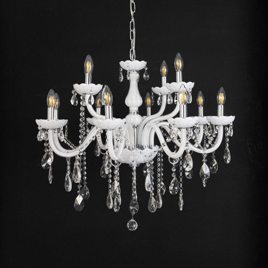 Classic white chandelier with crystal droplets displayed off against black background for elegant home decor style.