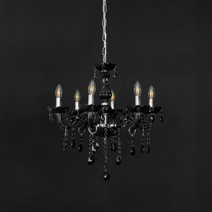 Black chandelier with crystal glass and glossy frame displayed off against black background for modern decor.