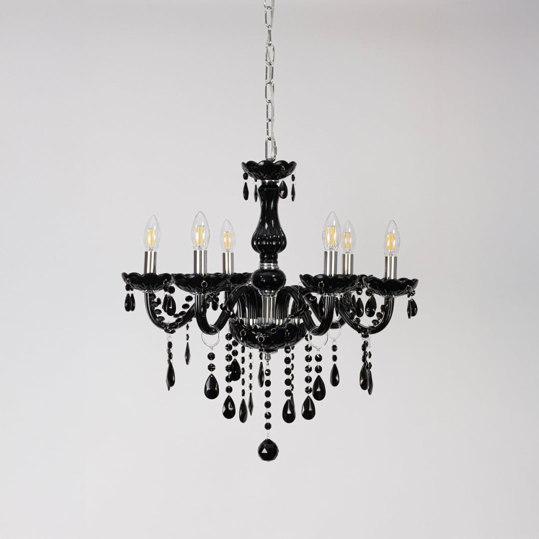 Classic black chandelier with crystal droplets displayed off on white background for stylish luxury lighting.