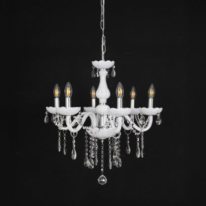 White chandelier with crystal details displayed off against black background highlighting modern interior style.