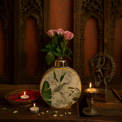 Tropical bird jar placed on a wooden table with candles and flowers adding warmth to traditional home decor.