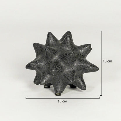 Black textured ceramic decorative object showing 13 cm height and 15 cm width suitable for table shelf or console placement.