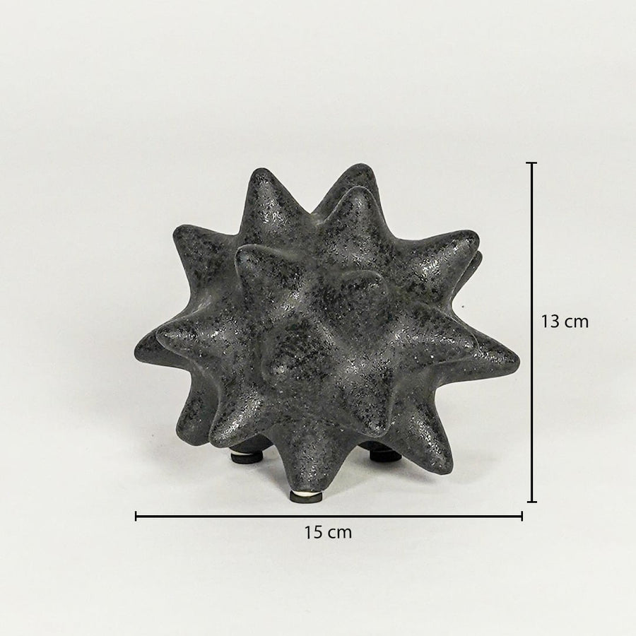 Black textured ceramic decorative object showing 13 cm height and 15 cm width suitable for table shelf or console placement.