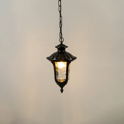 Closeup of black metal outdoor hanging lantern with glass panels on white background ideal for gate entrance and exterior decor lighting.