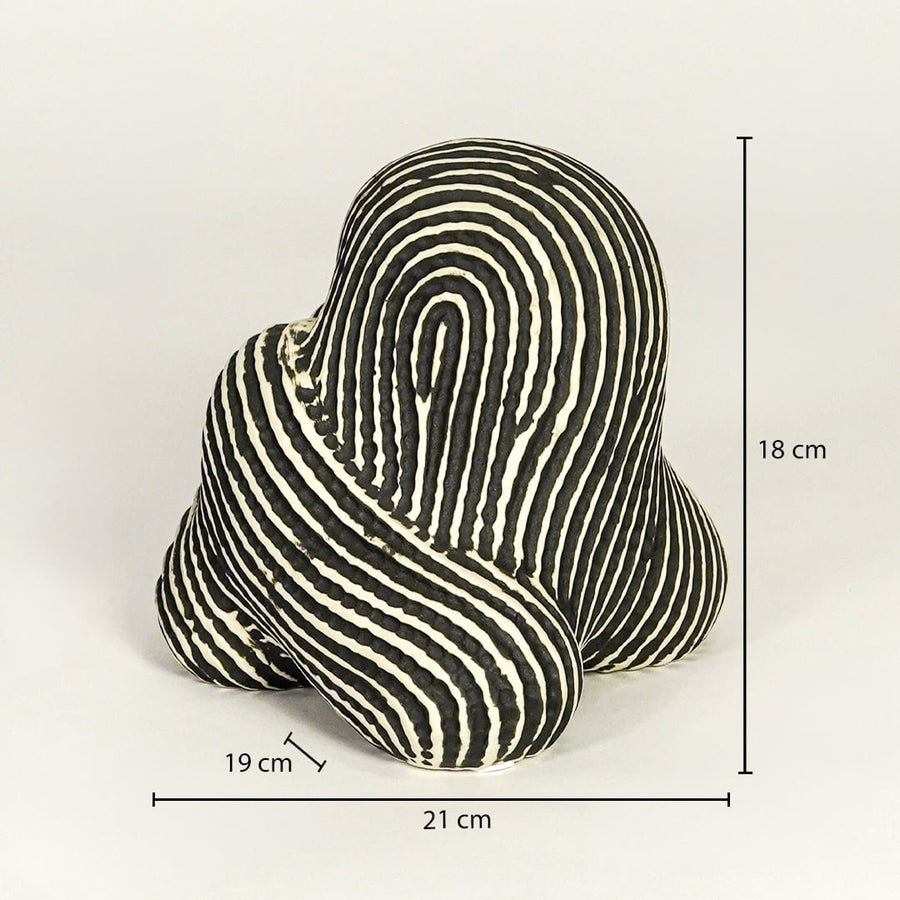 Black and white striped ceramic decor sculpture dimension image showing size proportions modern decorative tabletop object.