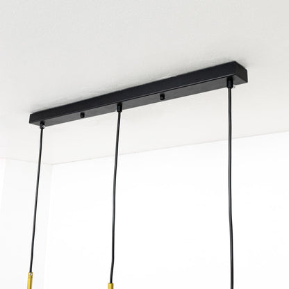 Closeup view of colorful pendant light showing gold metal details frosted globe and bright pastel shades for a stylish modern decorative lighting accent.