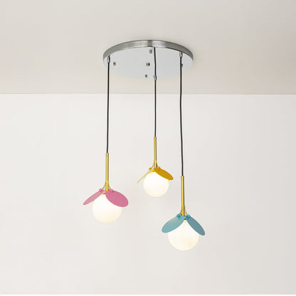 Pink yellow and blue metal pendant lights showcasing cheerful designs for contemporary home decor.