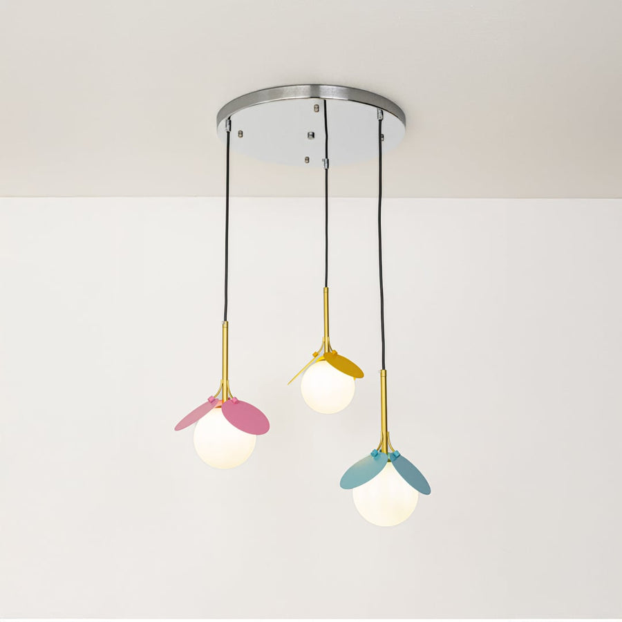 Pink yellow and blue metal pendant lights showcasing cheerful designs for contemporary home decor.