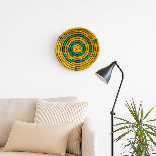 Colorful woven wall basket displayed above sofa with floor lamp and plant adding artistic texture to cozy interior Decor space.