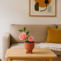 Terracotta metal scalloped planter decor styled in a warm modern room adding an earthy elegant accent to living room tables and corners.