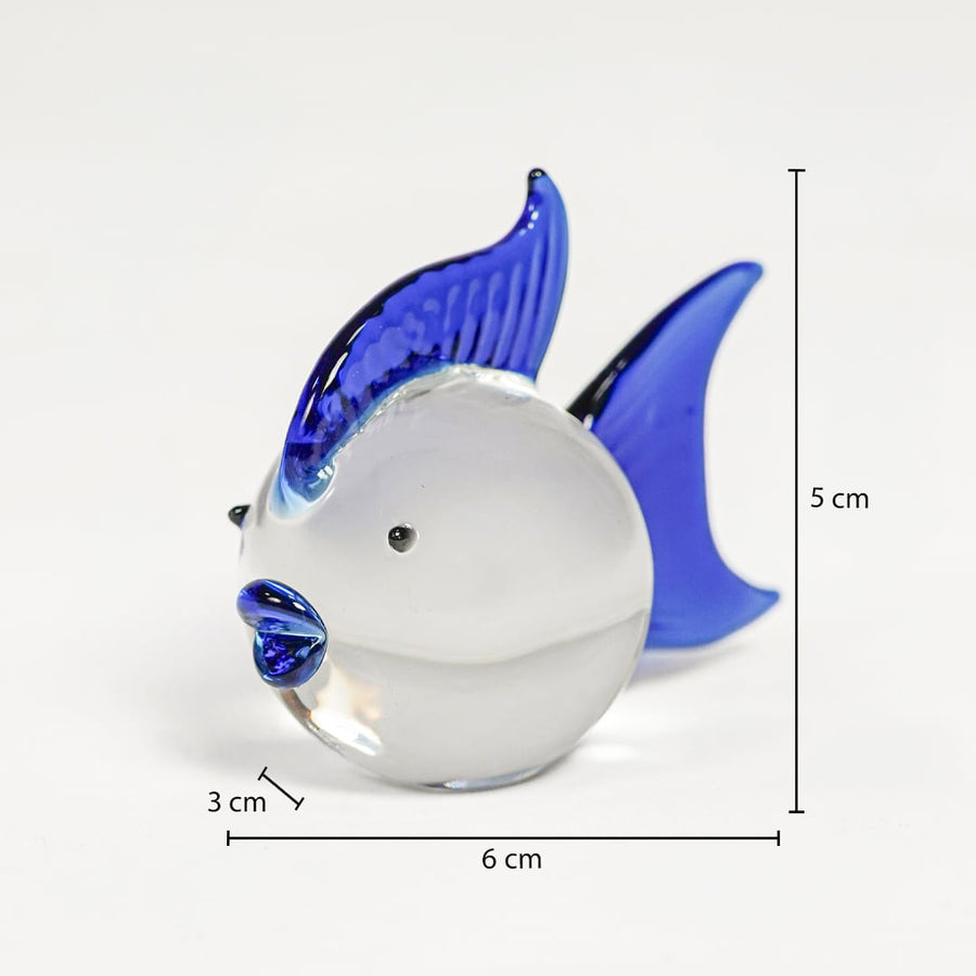 Blue and white glass fish figurine measuring 5 cm height 6 cm width and 3 cm depth ideal for small decor styling.