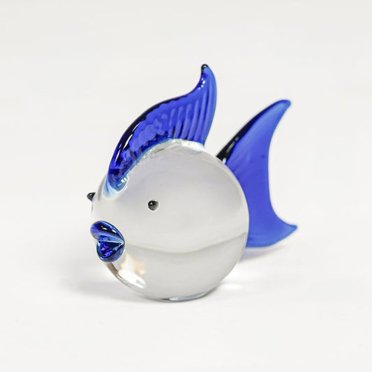 Blue and white glass fish figurine with vibrant curved fins isolated on clean white background for artistic home decor use.